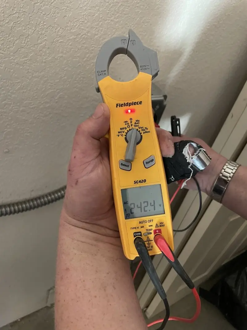 Voltage testing with clamp meter during Generator Installation in Mount Ephraim